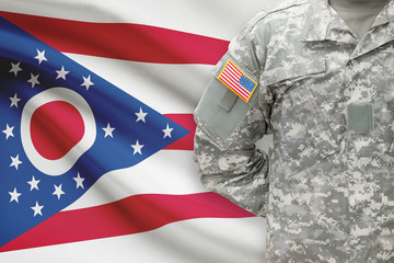 American soldier with US state flag on background - Ohio