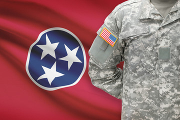 American soldier with US state flag on background - Tennessee