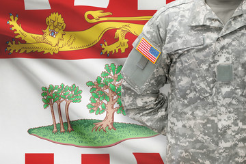 American soldier with Canadian province flag on background - Prince Edward Island