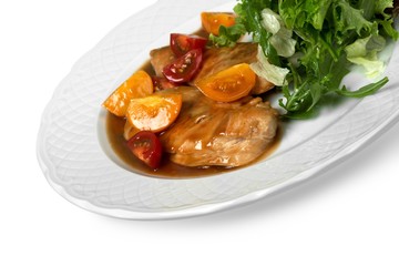 Grilled chicken breasts and vegetables