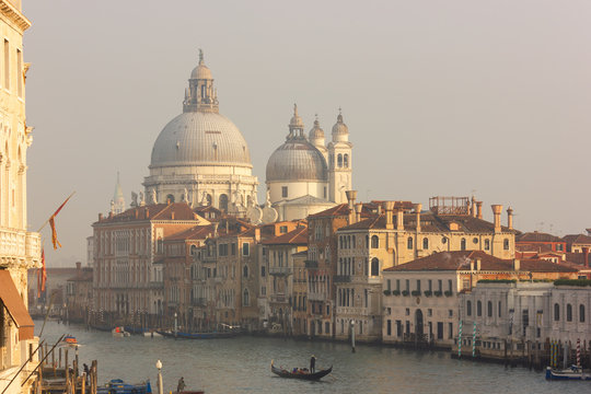 View to the Grand Canal and Basilica di Santa Maria della Salute from the Ponte dell'Accademia in Venice, Italy