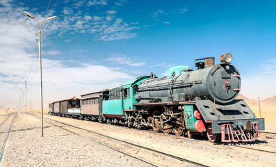 Fototapeta na wymiar Train wagons in the Wadi Rum desert in Jordan