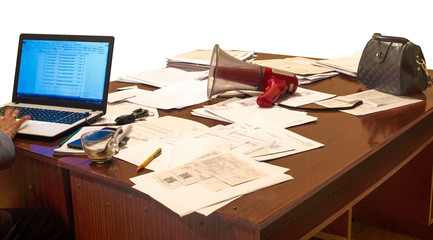 Office paper on the table with computer and loudspeaker