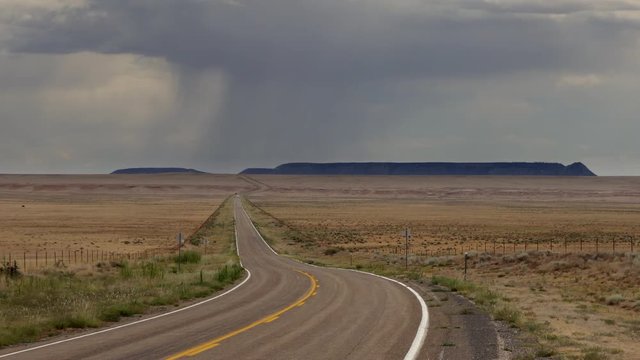 US highway to Duran in New Mexico, United States of America. Iconic view of beautiful American landscape during summer travel in Southwest USA, on the road trip