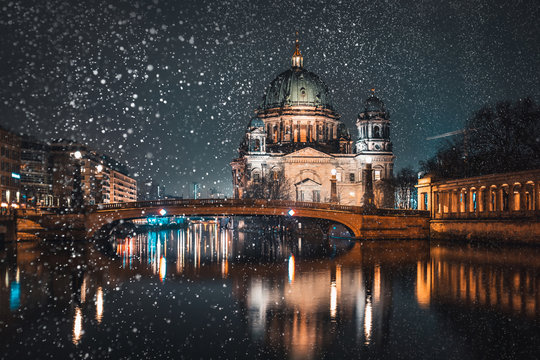Berlin Cathedral (Berliner Dom) on Spree river snowing in winter time