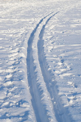 Fototapeta na wymiar Cross-country skiing tracks in fresh snow, sunny winter day, in Finland.
