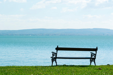 Naklejka na ściany i meble lakeside bench at october indian summer
