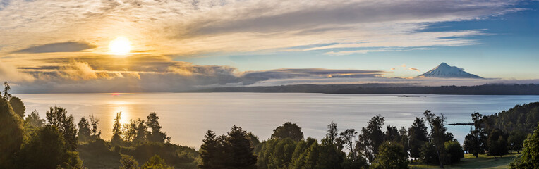 A dramatical sky view in between the clouds over Rupanco Lake, one of the Great lakes in Southern...