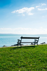 lakeside bench at october indian summer