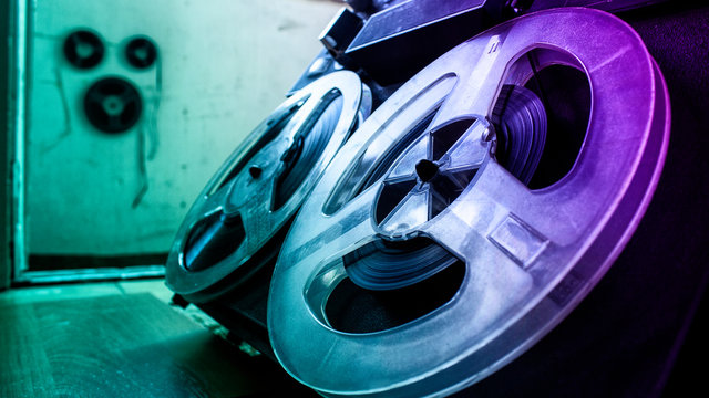 Old tape recroder,, neon lights, close up - Powered by Adobe