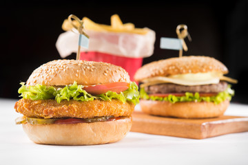 two hamburger and french fries