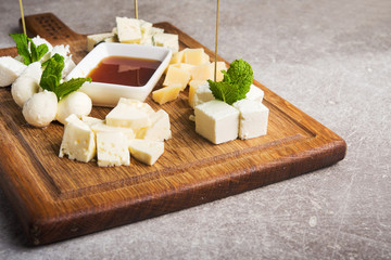 Gourmet cheese board, brie, parmesan and mozzarella