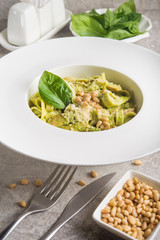 tasty italian pasta with pine nuts and cheese