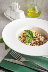 tasty italian pasta with basil and cheese