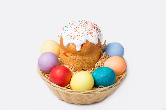 Easter. Traditional Russian and Ukrainian Easter cake (kulich) and painted eggs. Close-up, isolated,  selective foc