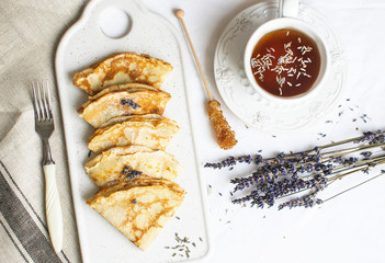 Homemade Pancakes with Honey, Tea, Lavender Flowers, Easy Food Concept Breakfast 