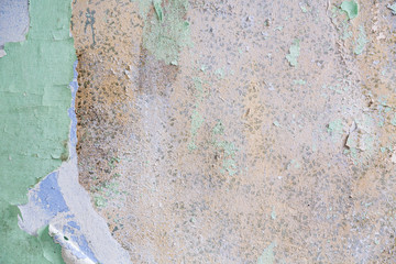 dirty old wall with pealing paint for backgrounds