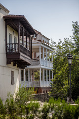 Fototapeta na wymiar openwork balconies of houses in different cities, Georgia