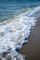 sea waves wash the sandy coast