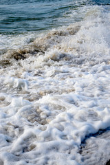 sea waves wash the sandy coast