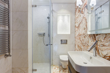 Stylish bathroom with element of  marble.
