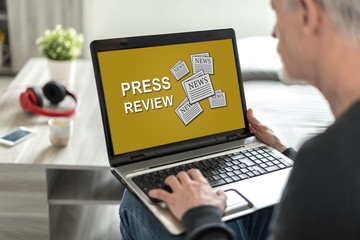 Press review concept on a laptop screen