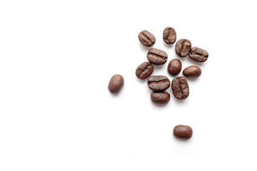 Coffee beans isolated on white background. Close-up.