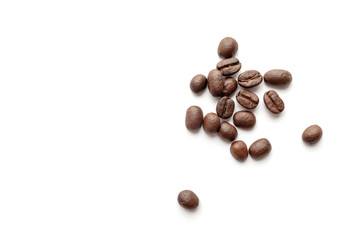 Coffee beans isolated on white background. Close-up.