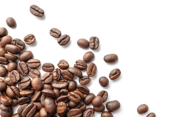 Roasted coffee beans isolated on white background. Close-up.