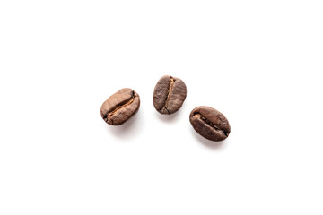 Coffee beans isolated on white background. Close-up.