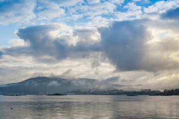 Cloudy and foggy dawn in Arousa bay