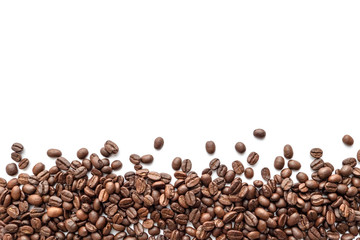 Roasted coffee beans on white background. Close-up.