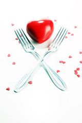 Festive table setting for Valentine's Day with forks and hearts