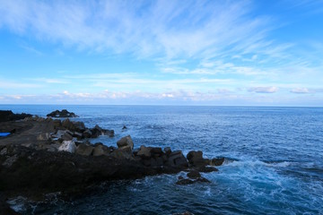 rocks in the blue sea