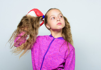 Boxing sport for female. Sport upbringing. Skill of successful leader. Girl cute child with red gloves posing on white background. Sport upbringing for leader. Cute kid with sport boxing gloves