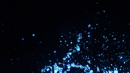 blue water splash on dark background for abstract water concept