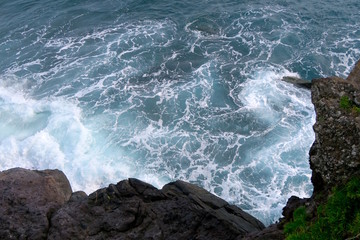 rocks in the blue sea