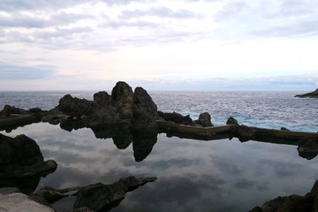 rocks in the blue sea