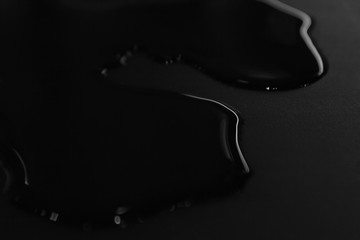 red paint splash isolated on black background