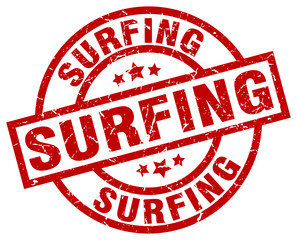 surfing round red grunge stamp