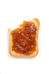 eating a slice of toast and jam on the absolute white background