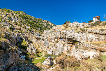 Naklejka premium Rocks at the Baatara gorge sinkhole in Tannourine, Lebanon