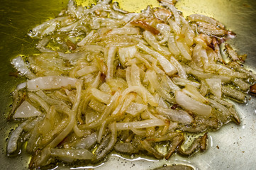 browned onions close up photograph