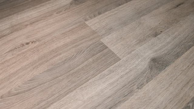 Rotating grey wooden surface