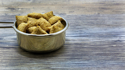 crackers on a plate on a wooden background	