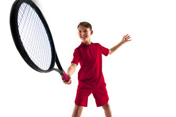 Obraz na płótnie Canvas Young teen boy tennis player in motion or movement isolated on white studio background. The sport, exercise, training concept