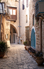 Fototapeta na wymiar a narrow street of the ancient city