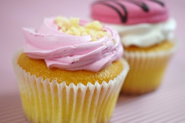 Delicious cakes on wooden background.Sweet dessert for coffee.