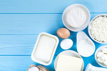  dairy products on blue wooden background