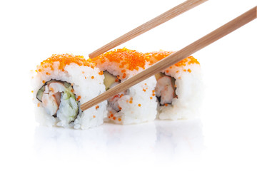 Roll Sushi California makis and chopsticks